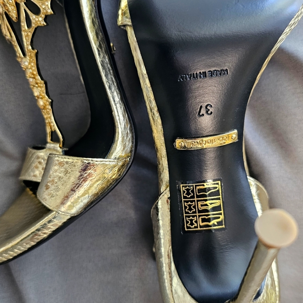 Butterfly designed Robert Cavalli Heels.  Never been worn brand new cost $1,200.